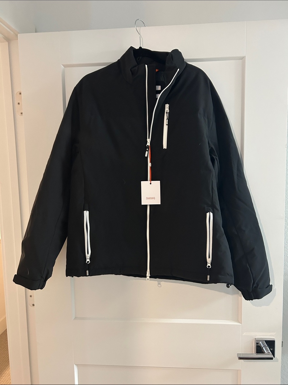 Swims Black Jacket with Orange Logo